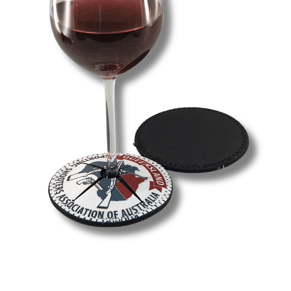 branded-neoprene-wine-glass-shoe-drink-coaster-queensland-association Custom printed neoprene wine glass shoe coaster fitted around a wine glass stem, featuring Queensland Sporting Shooters Association branding.