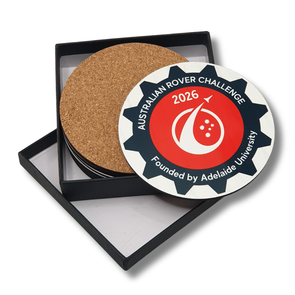 custom-mdf-cork-coaster-gift-set-university-event Custom printed MDF and cork coaster gift set featuring Australian Rover Challenge 2026 branding, displayed in a black presentation box.